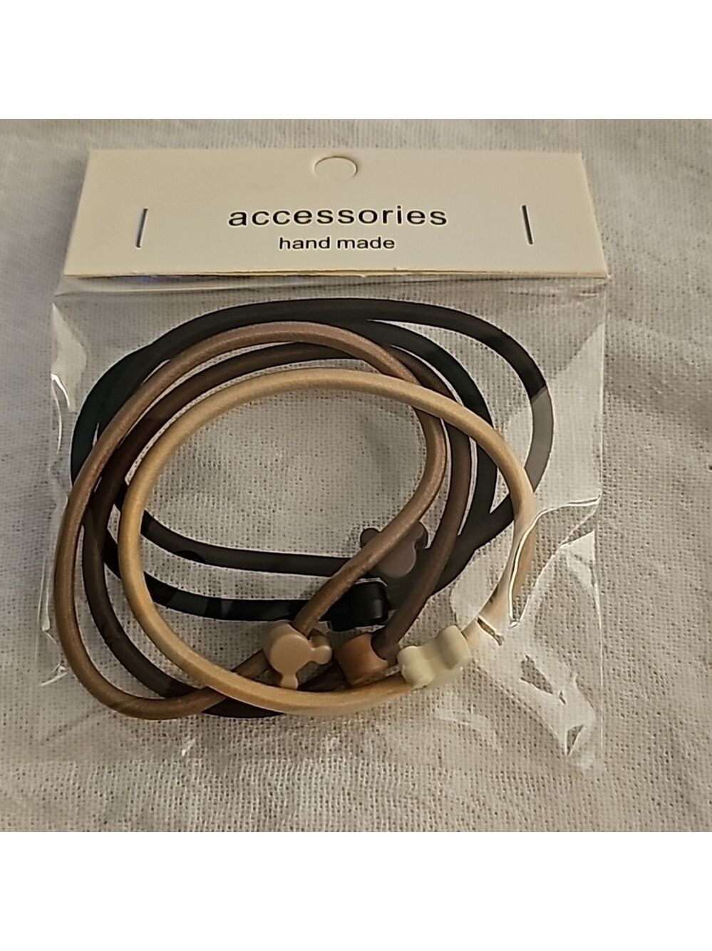5 pack of mickey mouse hair ties neutral colors
